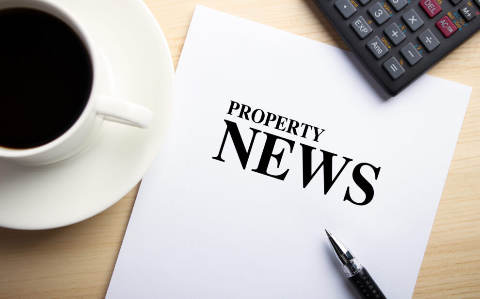 Text,Property,News,Is,On,The,White,Paper,With,Coffee,